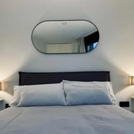 Modern Wave Escape With Private Parking And Rooftop Pool By Namaste Elite